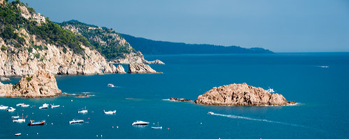 The costa brava with its cool blue waters and dramatic shoreline. Take a private day trip beyond Barcelona.