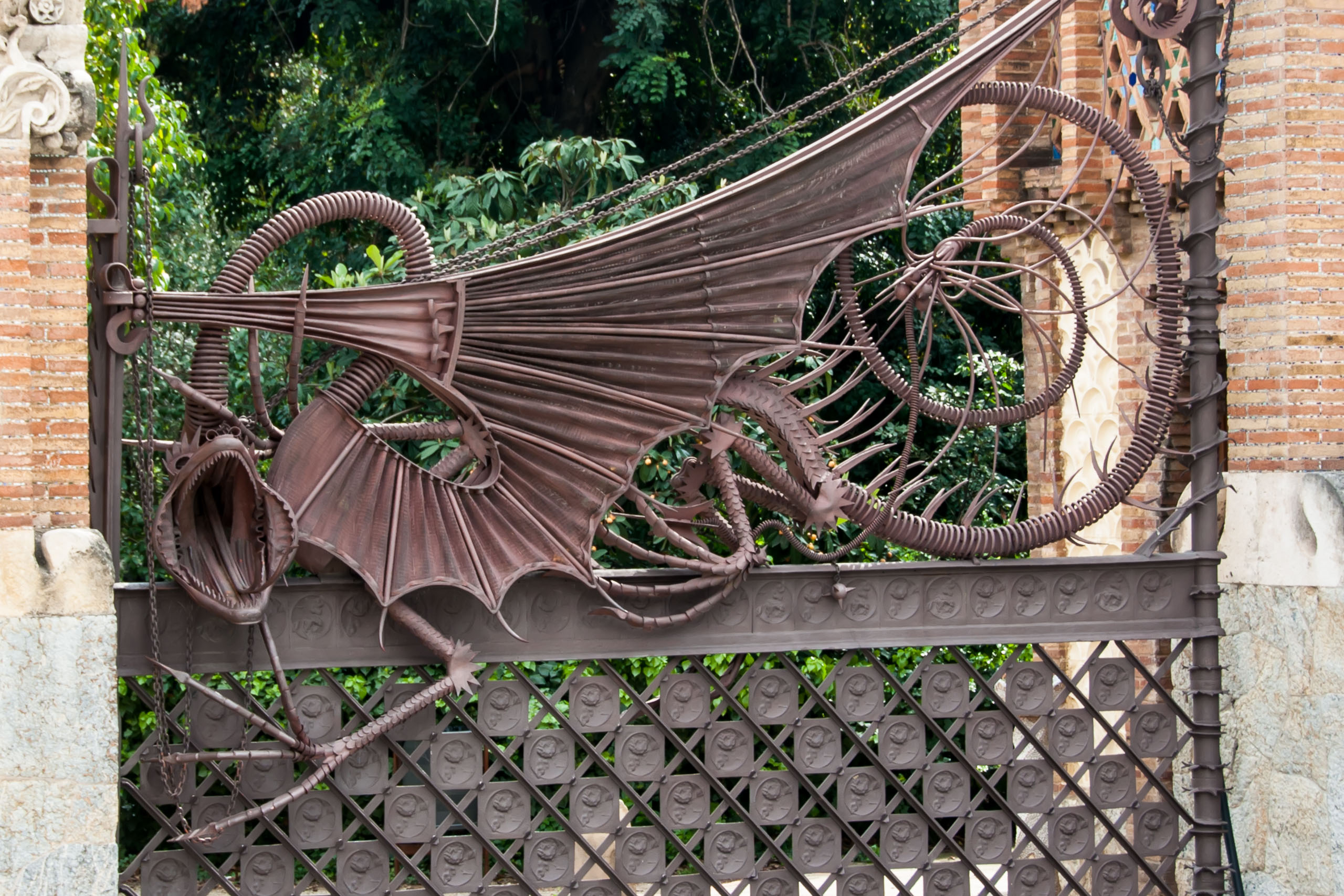 The wrought iron dragon gate at Finca Guell.