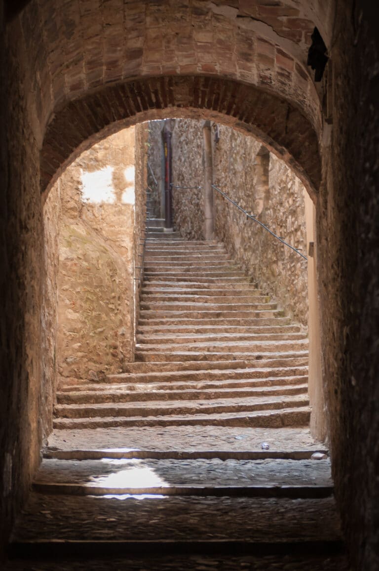 One of the many narrow medieval streets on a private day trip to Girona.