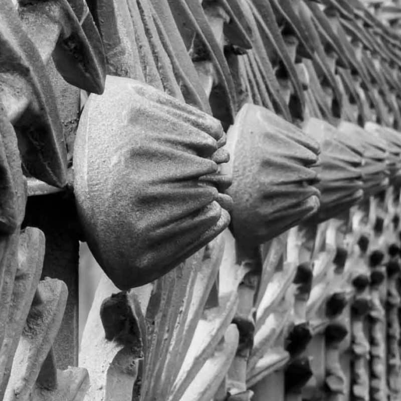 Details on an iron fence.