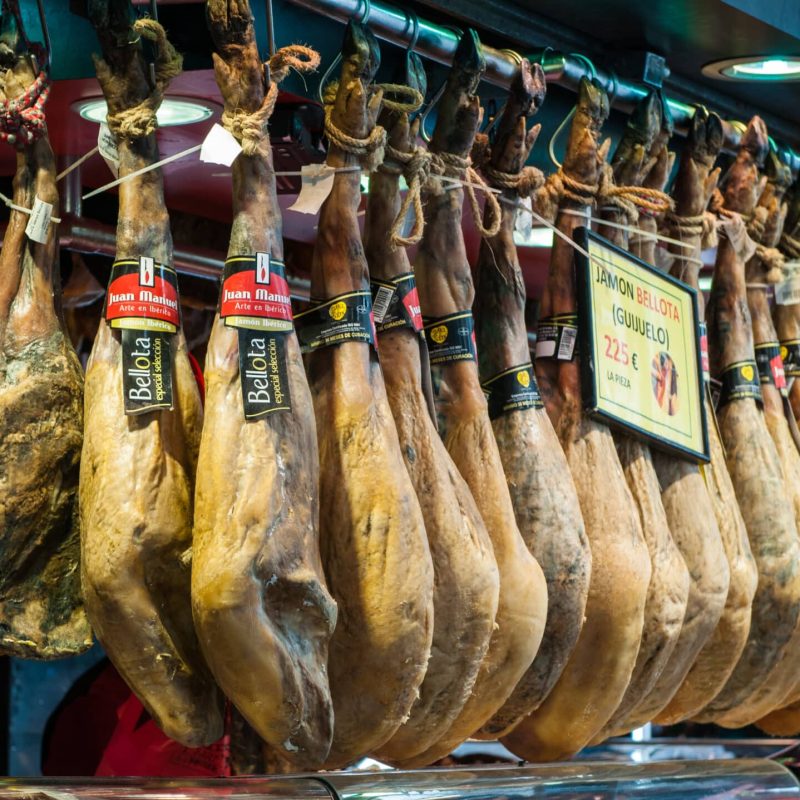 Cured Spanish "jamon iberico" at a stall in the Boqueria markete.