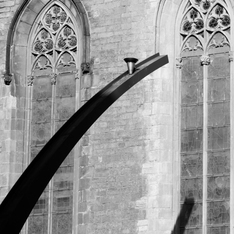 A burning flame memorial outside the Santa Maria del Mar church.