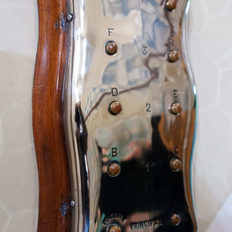 The elevator call buttons.