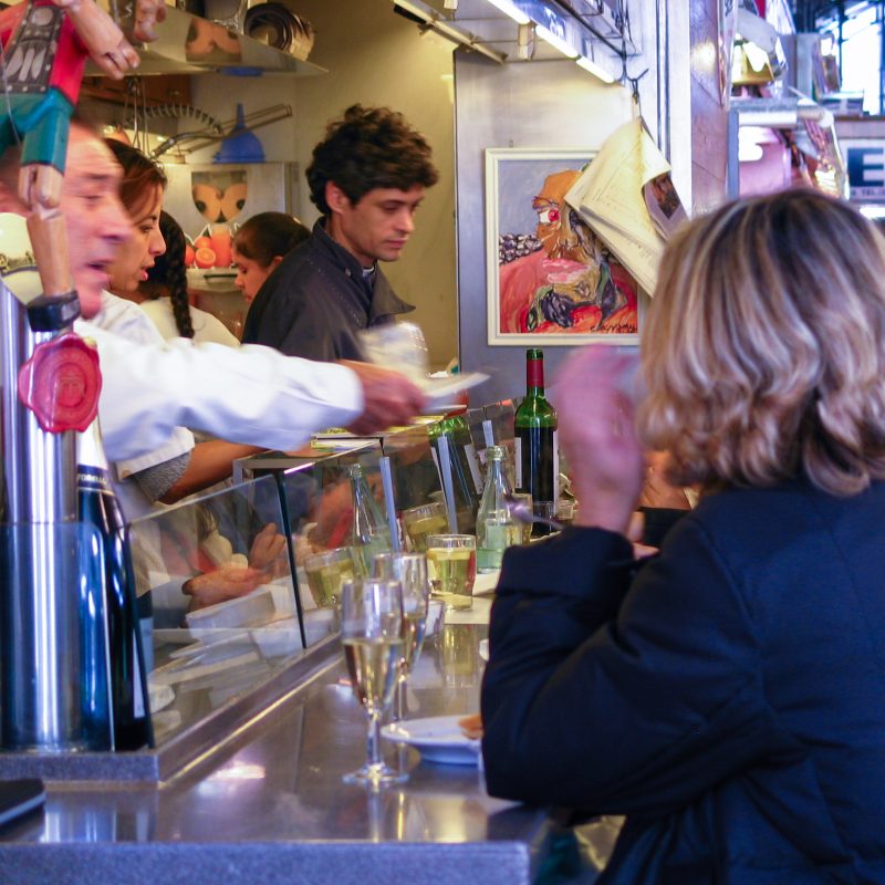 Having a tapa at the Boqueria Market.