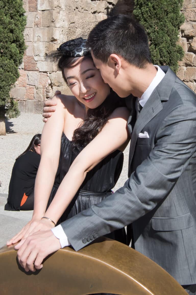 A couple share a moment during their photo shoot in front of the Aqueduct in the old city.