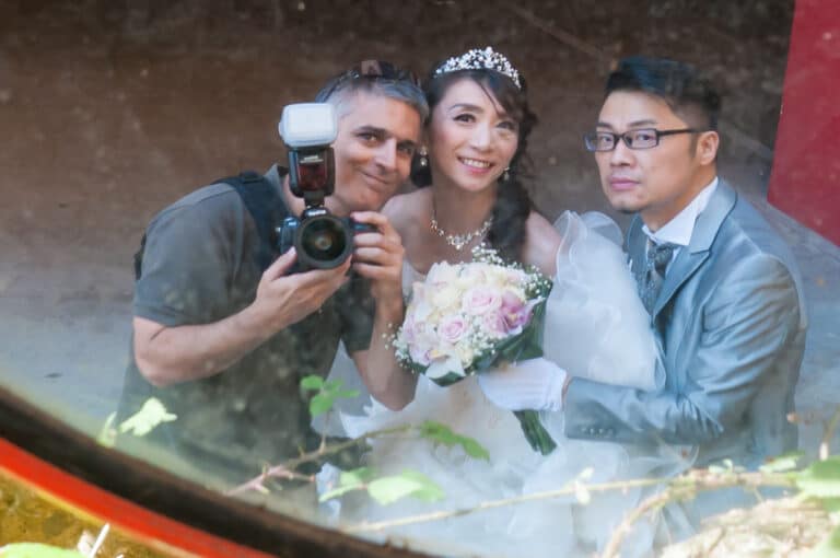 Gaston having some fun with clients on a pre wedding session in Barcelona.