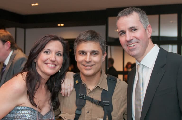 I handed my camera to a guest and had them take this shot of me and my clients during their reception.
