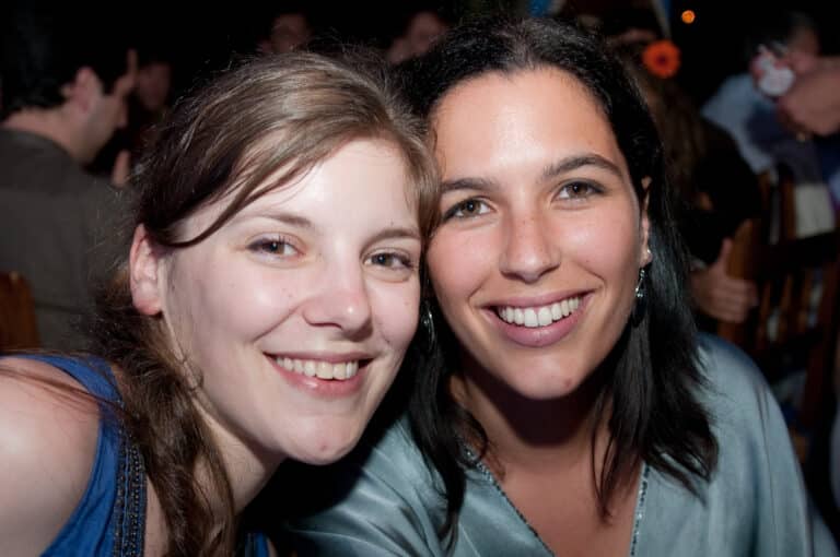 Two friends pose for a picture at this party.
