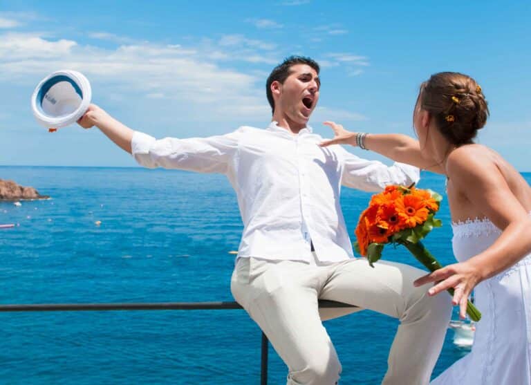 A pre wedding photo shoot in the Costa Brava with the blue water as a backdrop.